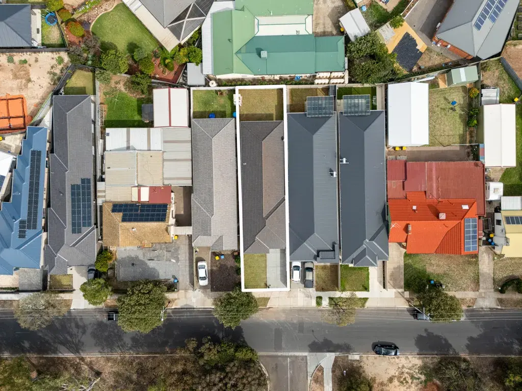 5A Rowe Avenue, Northfield, SA 5085 Aerial view of suburban houses layout.