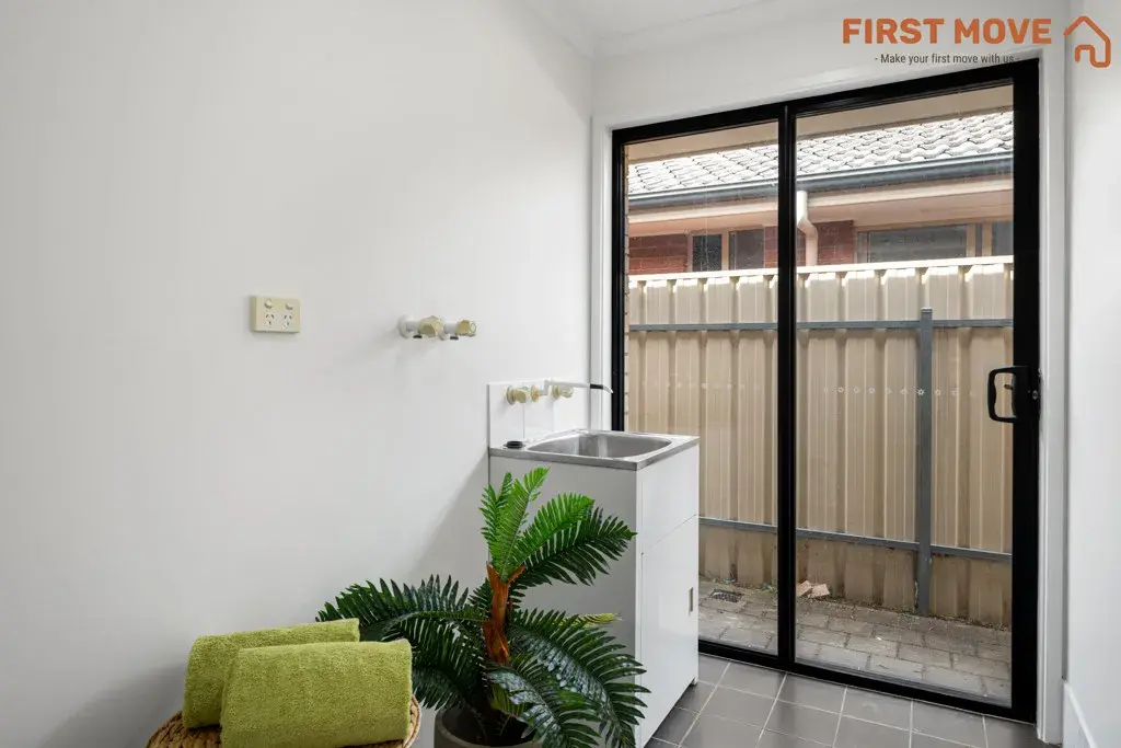 5A Rowe Avenue, Northfield, SA 5085 Bright laundry area with glass door