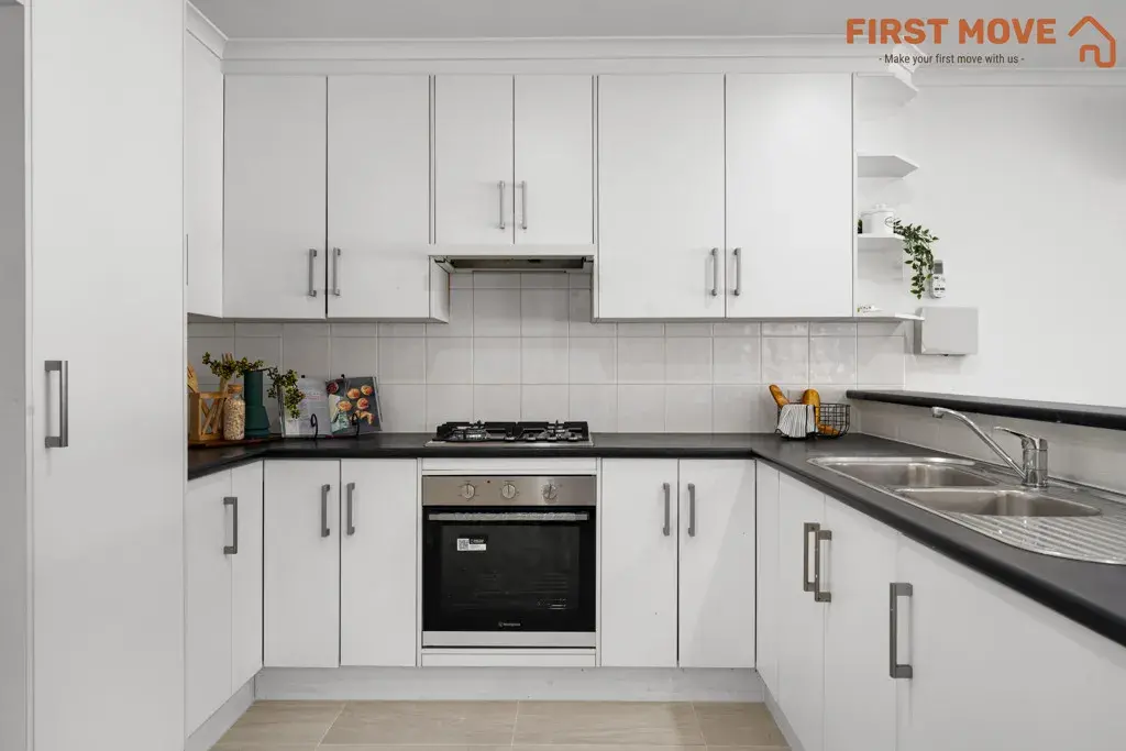 5A Rowe Avenue, Northfield, SA 5085 r Modern kitchen with white cabinetry.